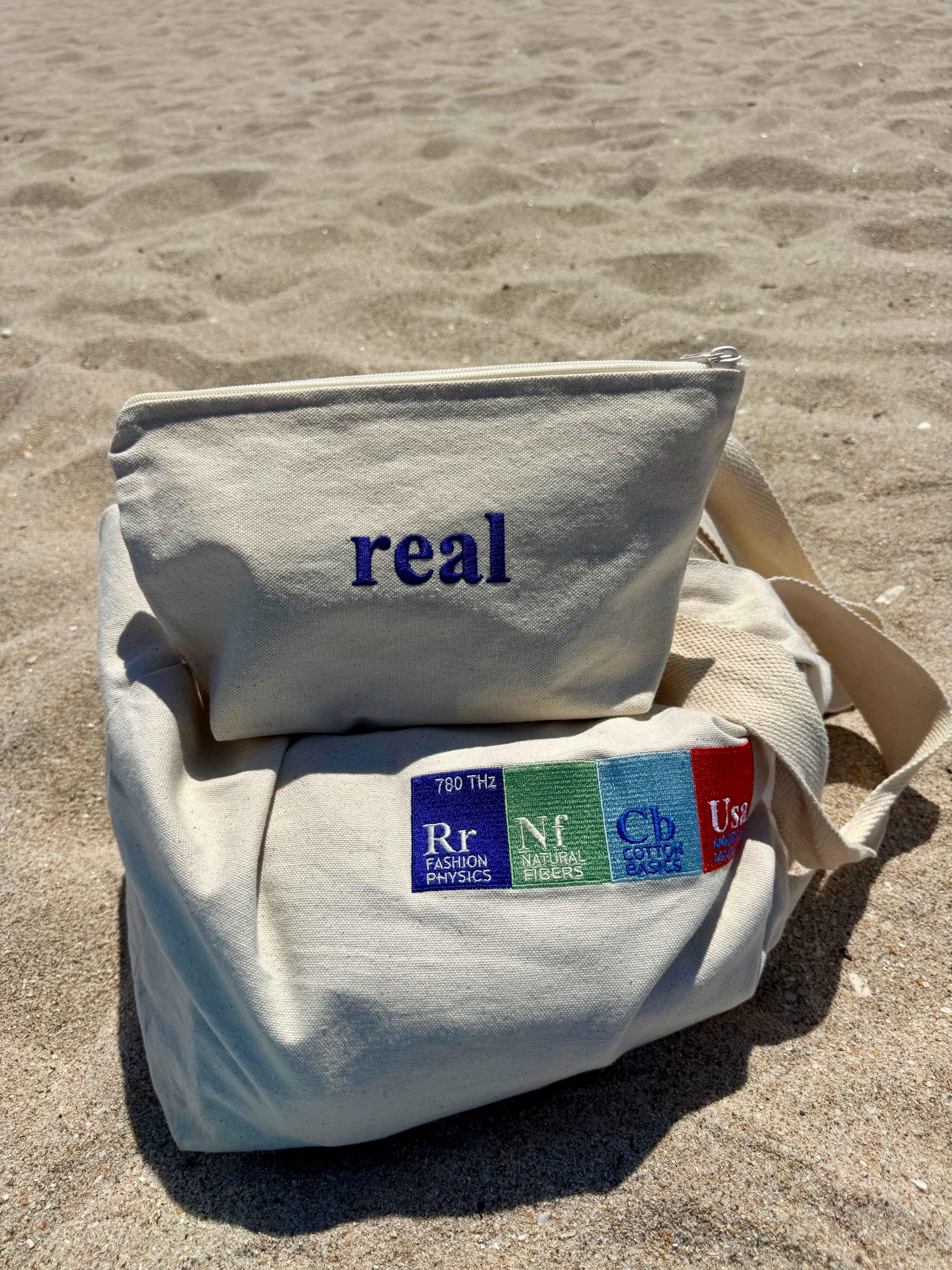 Organic Cotton Canvas Travel Pouch with purple "real" embroidery | RaileyReal