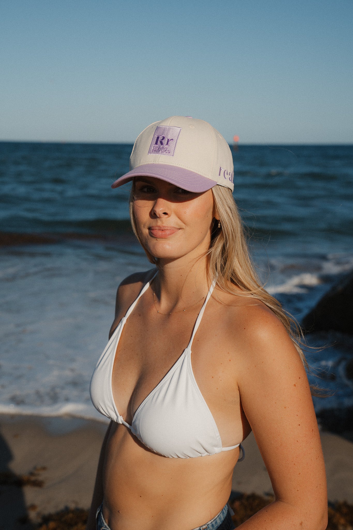 Organic Cotton Founder’s Trucker Hat with light lavender bill and logo